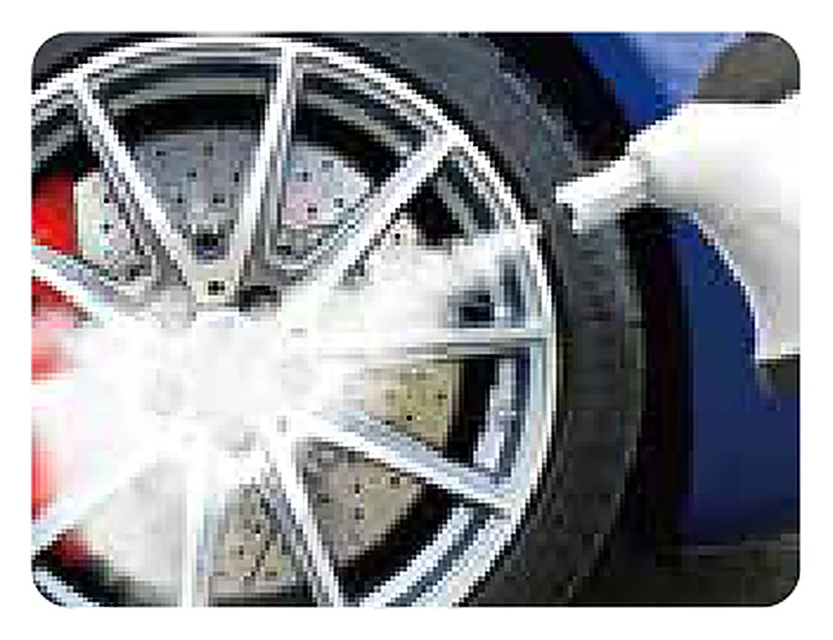 Steam cleaning an alloy wheel